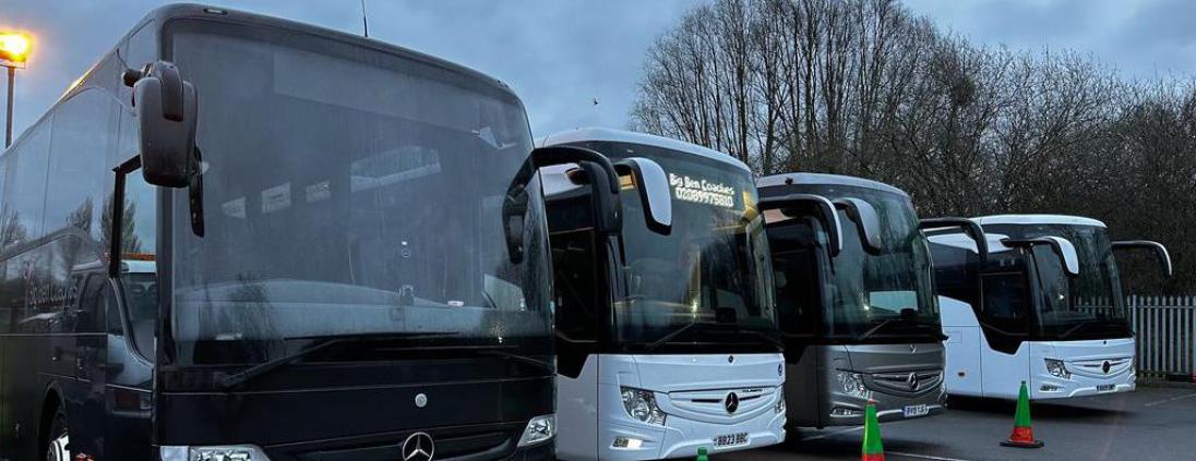 Buses parked in a row